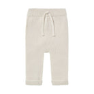 Beige knitted baby pants with a drawstring on a white background