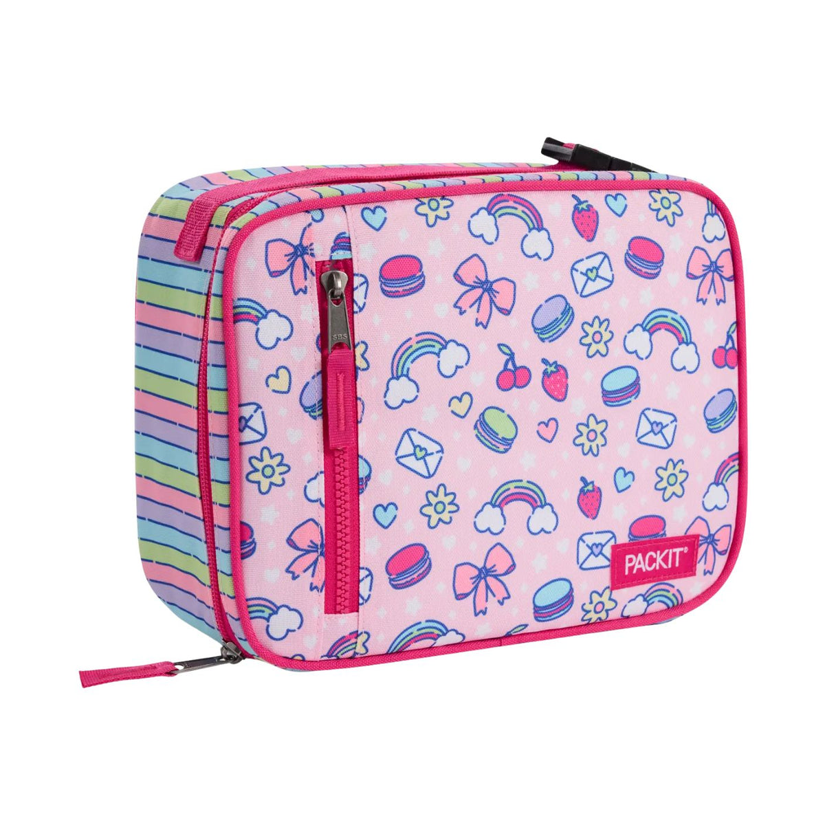 A pink PACKiT lunch bag with a colorful macaron, rainbow, bow, and strawberry pattern, featuring a pink zipper pocket and striped side panel, shown on a white background.