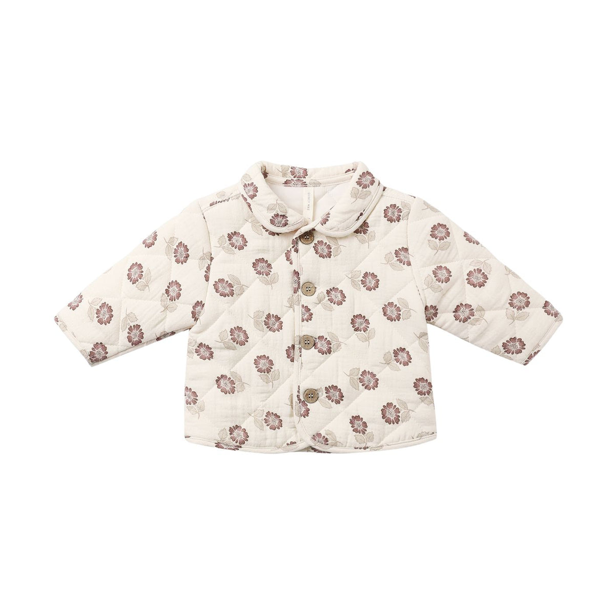 A quilted baby jacket with a cream-colored background and a repeating brown floral pattern, featuring a bow detail at the collar and a button closure.