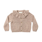 A light brown knit baby cardigan sweater with a ruffled Peter Pan collar and front buttons, laid flat on a white background.