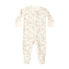 A baby long-sleeve footed sleeper in cream with a delicate beige floral pattern, featuring a snap closure at the neck.