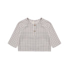 A children's short-sleeve henley top in a light gray and white gingham plaid pattern, featuring a three-quarter collar and three brown buttons on the chest.