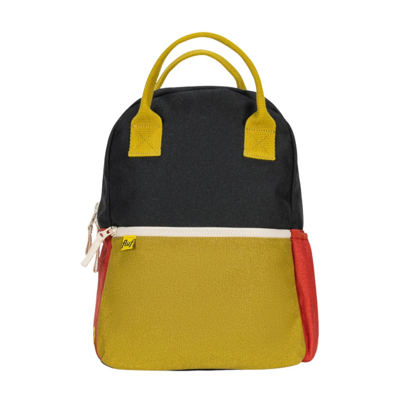 A color-blocked canvas backpack with a black top half, mustard yellow bottom half, red side pockets, and mustard yellow top handles, shown against a plain white background.