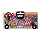 Omy Hot Dogs & Sausages sticker set in a themed cardboard packaging designed to look like a hot dog cart, featuring various illustrated food stickers.