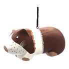 A hand-painted wooden dog ornament shaped like a brown and white dog, with a black hanging string, shown against a plain white background.