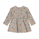 A long-sleeve baby dress in heather gray featuring an all-over print of teddy bears and small hearts in brown and beige, shown flat against a white background.