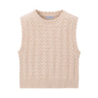 A sleeveless knit sweater vest in a light beige color, featuring a textured chevron pattern and ribbed collar, hem, and cuffs, shown against a plain white background.