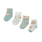 Four pairs of baby socks arranged in a row on a white background. The socks feature cute teddy bear illustrations and include colors of mint green, cream, and light blue, with ribbed cuffs and toes.