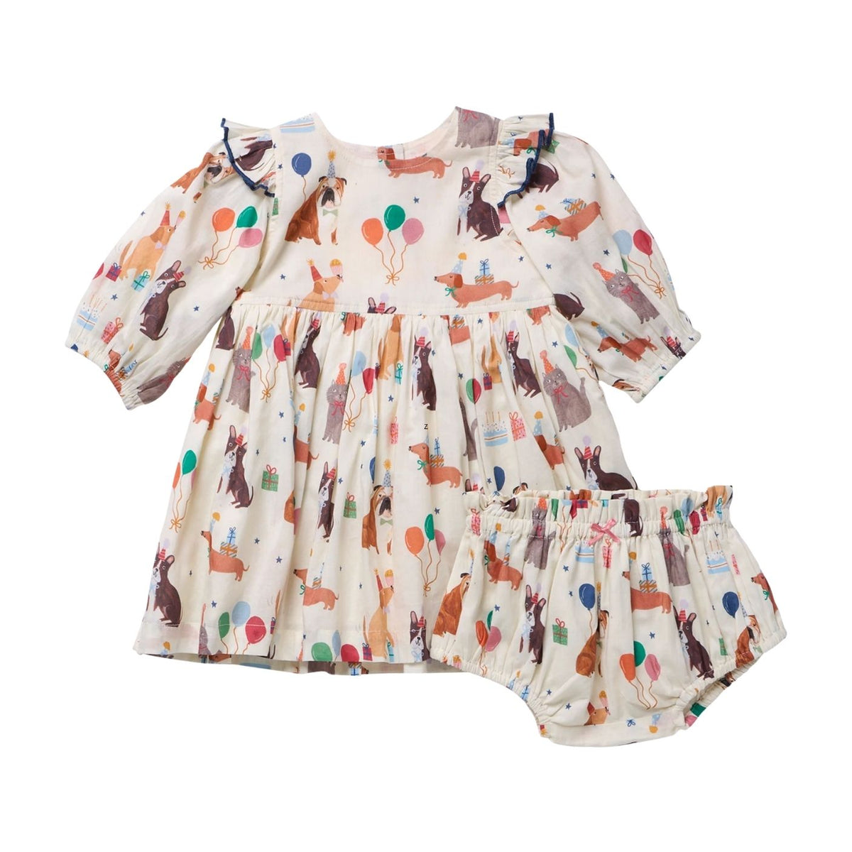 A baby girl's two-piece outfit set consisting of a long-sleeve dress and matching bloomers, featuring an all-over print of rabbits, balloons, and gifts on a cream-colored background.