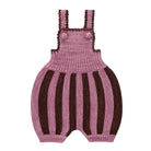 A hand-knit baby romper in dusty pink and dark brown vertical stripes, shown flat against a solid white background.