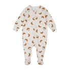 A baby footed one-piece sleeper in cream with a brown and orange hedgehog print, shown flat on a white background.