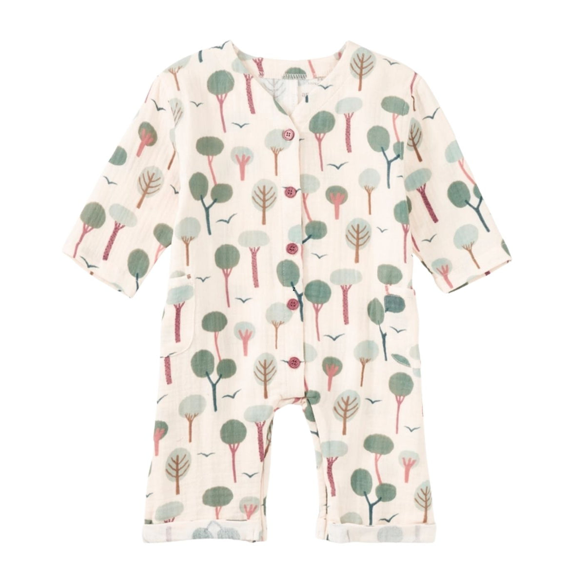 A baby long-sleeve footless romper in cream cotton fabric with an all-over tree print in muted green, gray, and dusty pink, featuring a snap-button front closure.