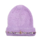 A light purple faux fur beanie hat featuring a decorative band of clear rhinestones and a small gold horse charm at the front, set against a plain white background.