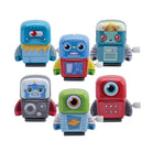 6 Toy robot color red, blue andgreen with a single and double eye on a white background
