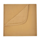 A square tan fabric item, likely a blanket, quilt, or towel, shown flat against a white background with one corner folded over to reveal the stitched interior.