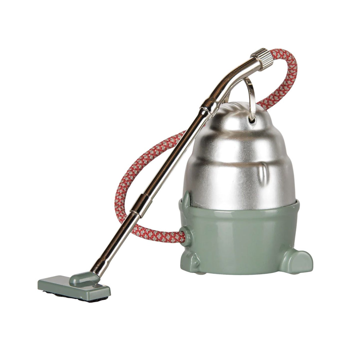 A product photo of the Maileg miniature dark mint mouse vacuum cleaner against a clean white background, featuring a vintage-style canister body, a patterned red-and-white flexible fabric hose, and a metal handle with a tiny floor nozzle.