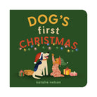 Square board book cover for Dog's First Christmas by Natalie Nelson. Set against a deep green background, the title reads "DOG'S first CHRISTMAS" in playful yellow and white lettering, with a strand of colorful fairy lights draped below it. At the bottom, a white dog wearing a Santa hat and a blue bandana sits looking up happily alongside a smaller dog in striped pajamas reaching a paw toward wrapped holiday gifts.