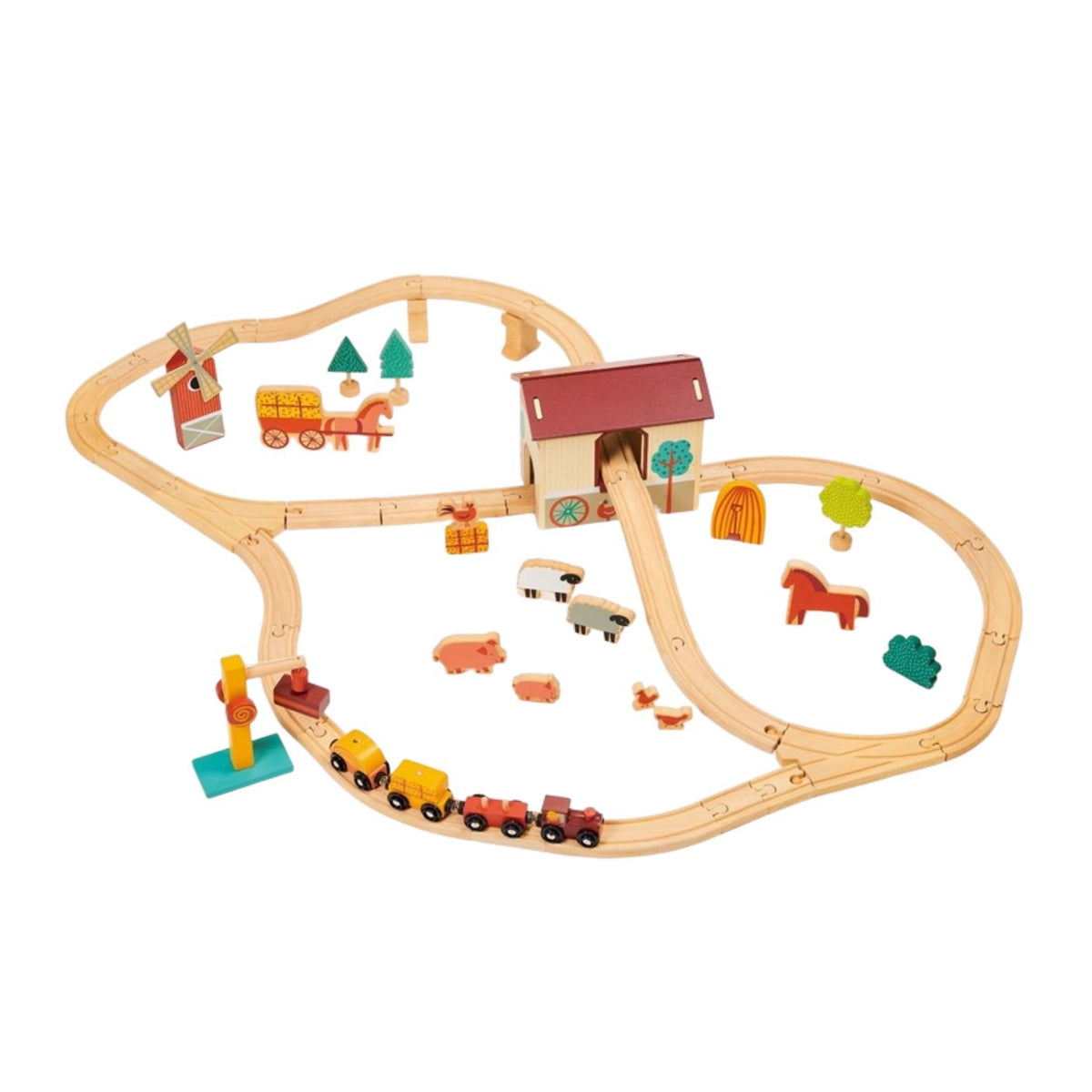 A wooden train set with tracks arranged in an oval layout featuring a red barn, a windmill, green trees, and various farm animals including sheep, pigs, and horses, accompanied by a small wooden train with yellow and red carriages.