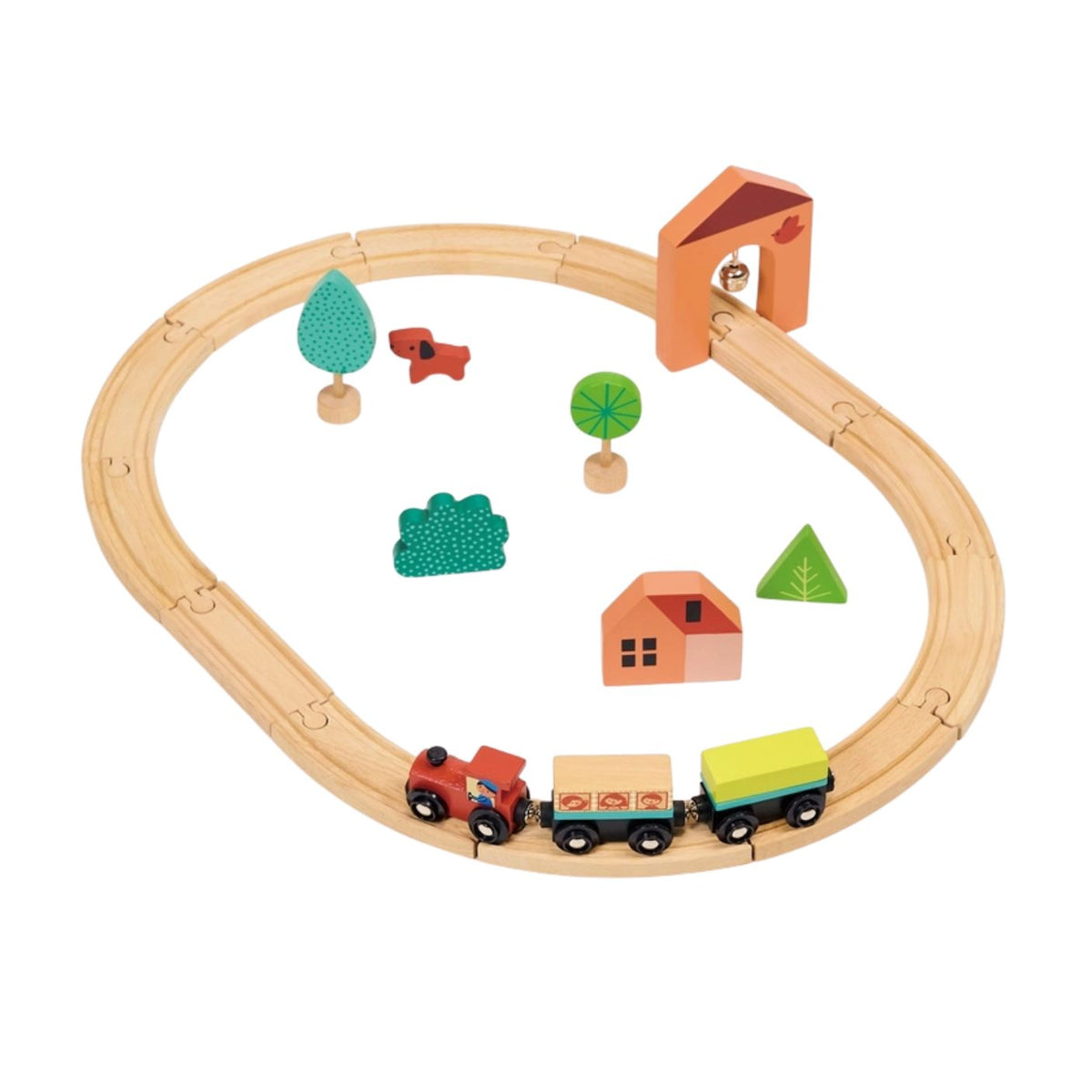 A product photo of the My First Wooden Train Set by Mentari on a white background, featuring a circular wooden track enclosing a red and yellow toy train, a red house, green trees, and colorful block accessories.