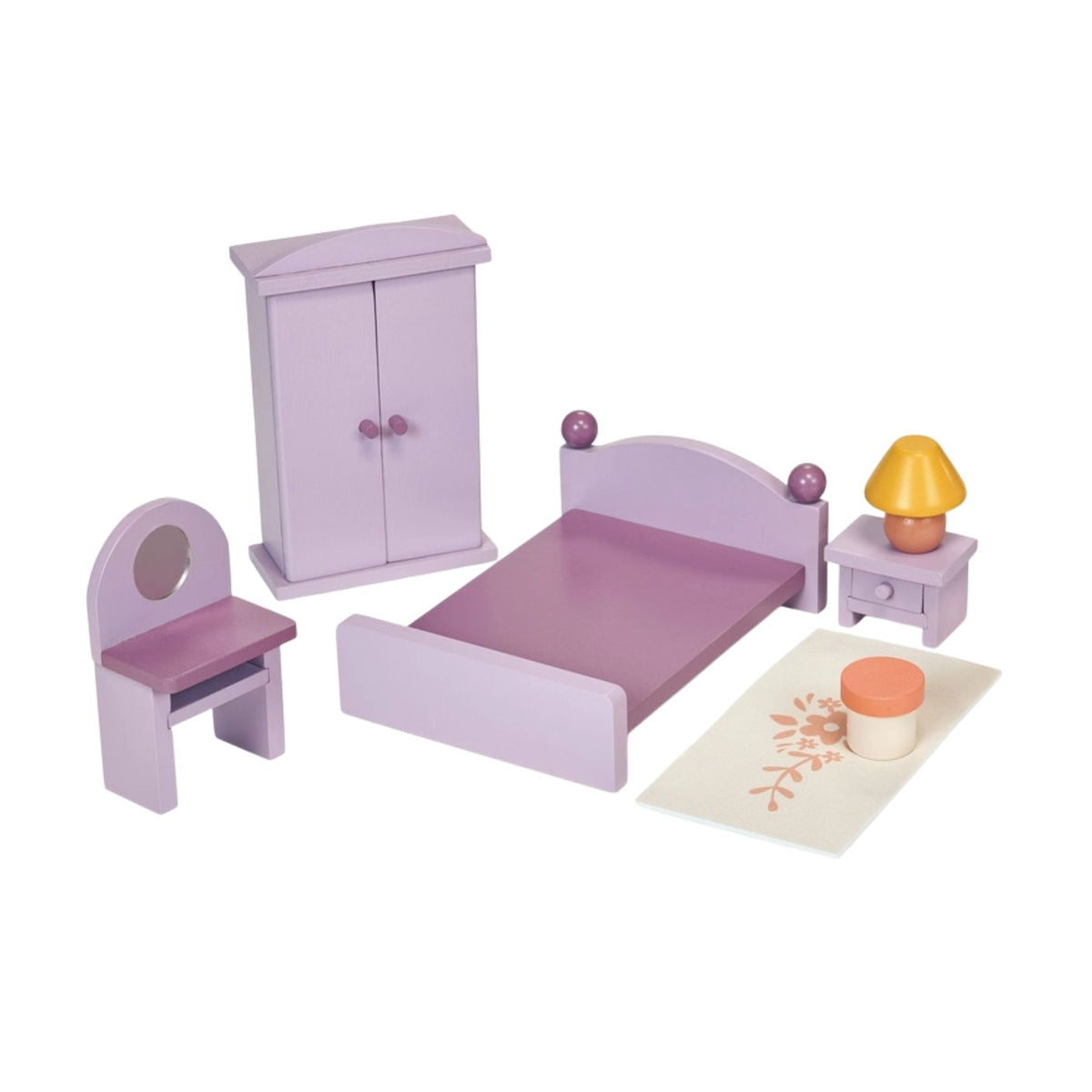 A product photo of the Wooden Bedroom Furniture set by Mentari, featuring a collection of miniature purple wooden dollhouse furniture arranged on a white background. The set includes a double bed with a purple frame and bedding, a wardrobe with opening doors, a dressing table with a matching stool, a bedside table topped with a yellow-shaded lamp, and a small printed rug with a floral pattern.