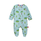 A baby long-sleeve footed sleeper in light blue with an all-over golf course print, featuring green putters, trees, flags, and hats, shown on a plain white background.