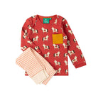 A children's two-piece pajama set on a white background, featuring a red long-sleeve top with a repeating horse print and a mustard yellow chest pocket, paired with matching pink and cream striped pants.