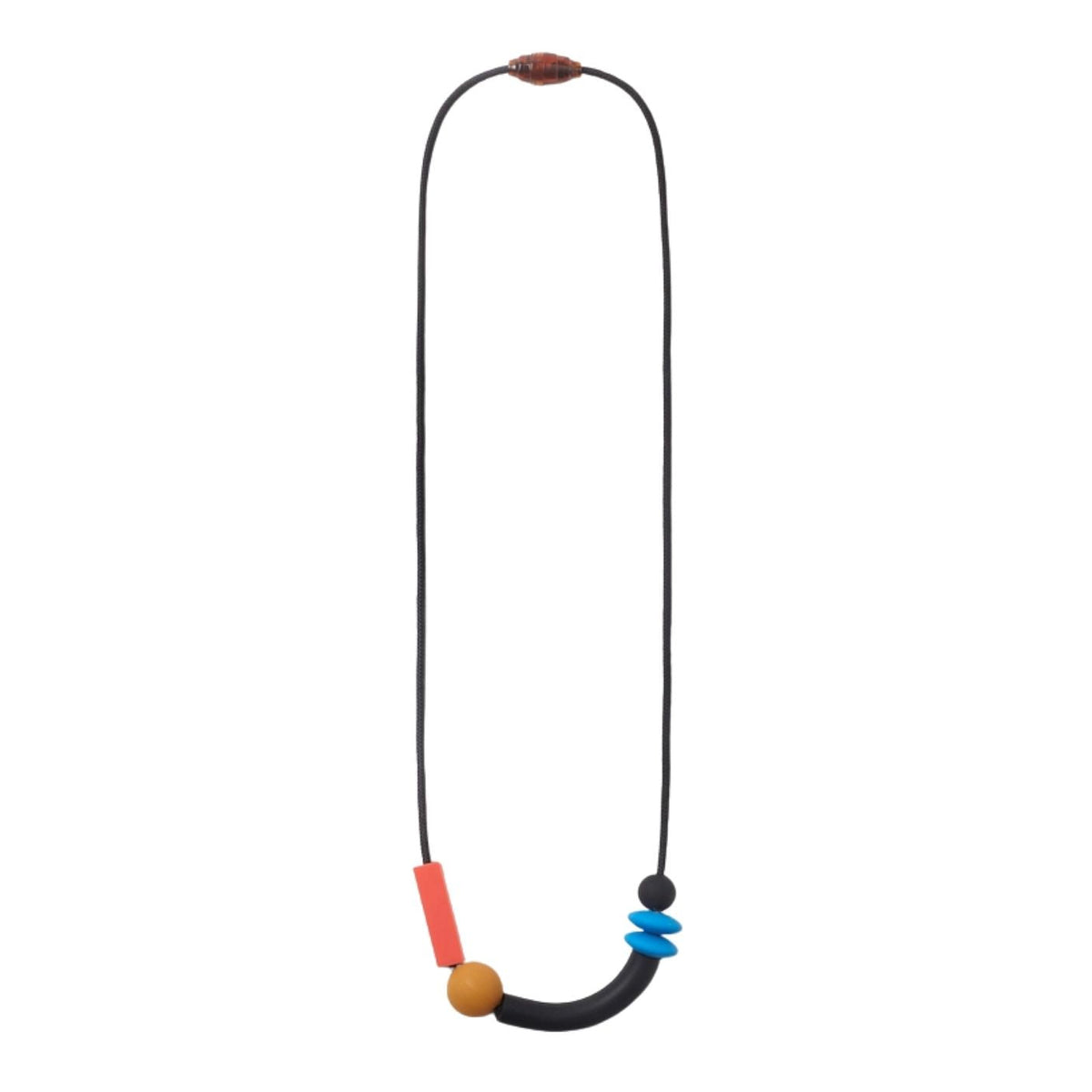 A minimalist geometric beaded necklace featuring a black cord, a large black curved bar, a round tan bead, a bright coral-red rectangular bead, a blue spiral bead, and a small black bead at the end.