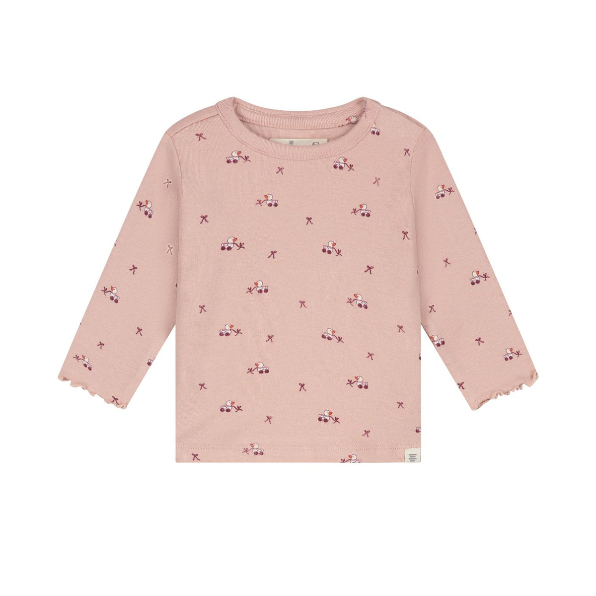 A pink long-sleeve baby top with a delicate all-over print of small flowers, stars, and bows, featuring scalloped edges on the cuffs.