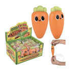 Squishy carrot toys with packaging and a hand holding one.