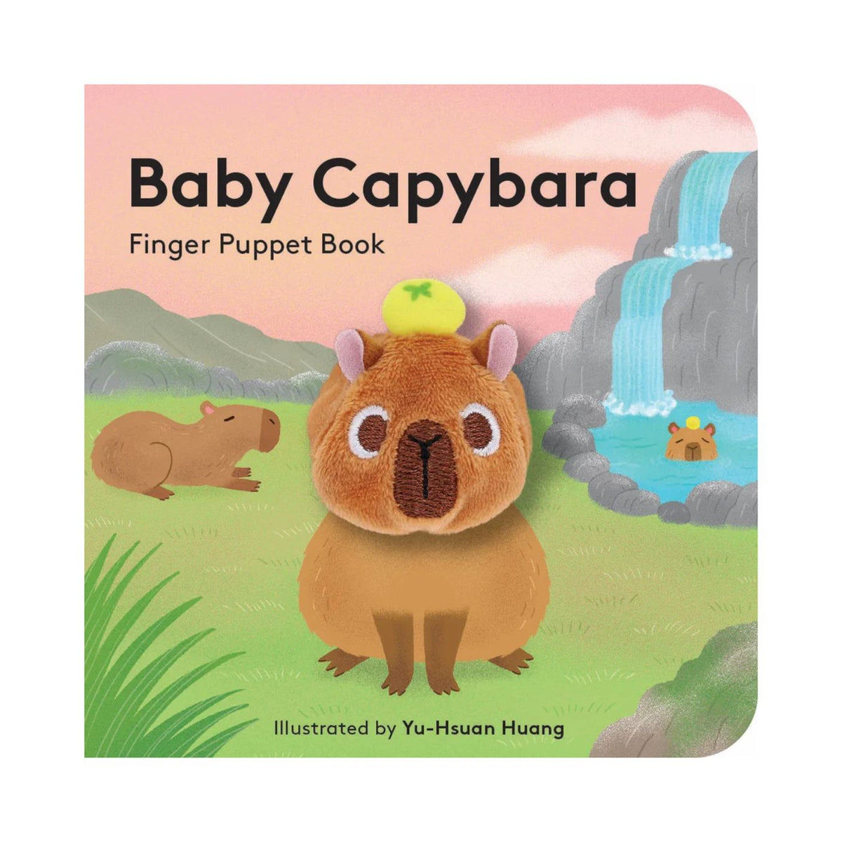An illustrated book cover for "Baby Capybara - Finger Puppet Book" featuring a cute, plush brown capybara finger puppet centered on a green and white background, with an adult capybara and a small capybara relaxing in a hot spring illustrated in the background.