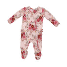A baby long-sleeve footed sleeper in light pink with a red, pink, and brown floral print, shown flat on a white background.