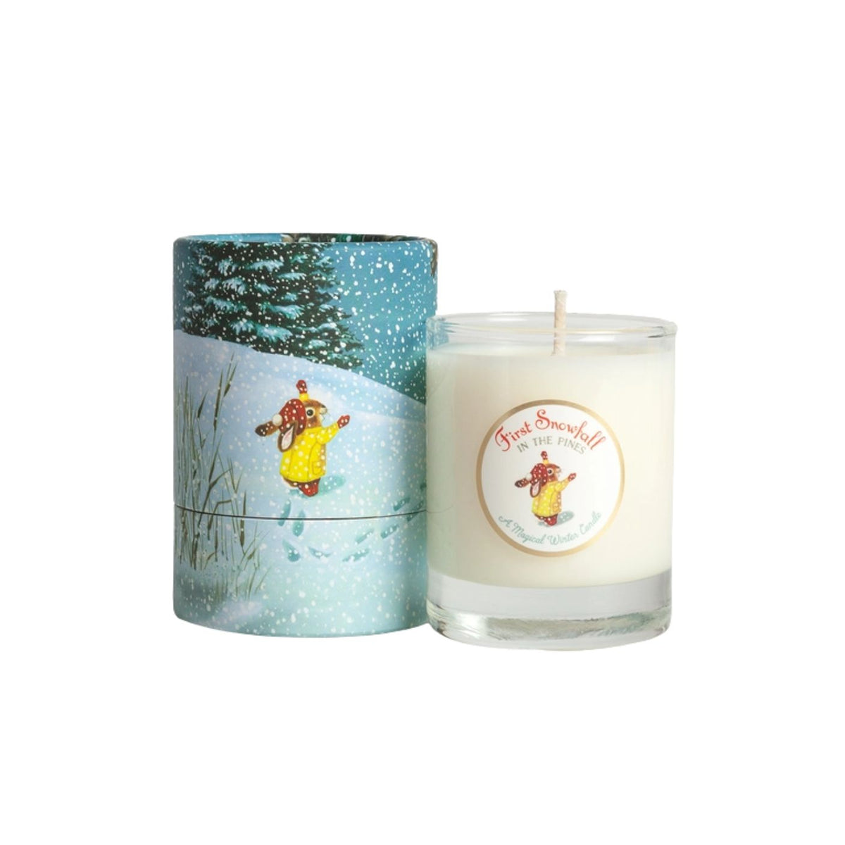 A scented candle shown next to its matching cylindrical tin packaging. The candle is in a clear glass jar filled with creamy off-white wax and features a round label with a cartoon character in a yellow coat.