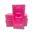 Stack of pink 'Coffee + Cream' chocolate bars with a visible brand logo on a white background