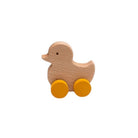 Wooden duck toy with wheels on a white background