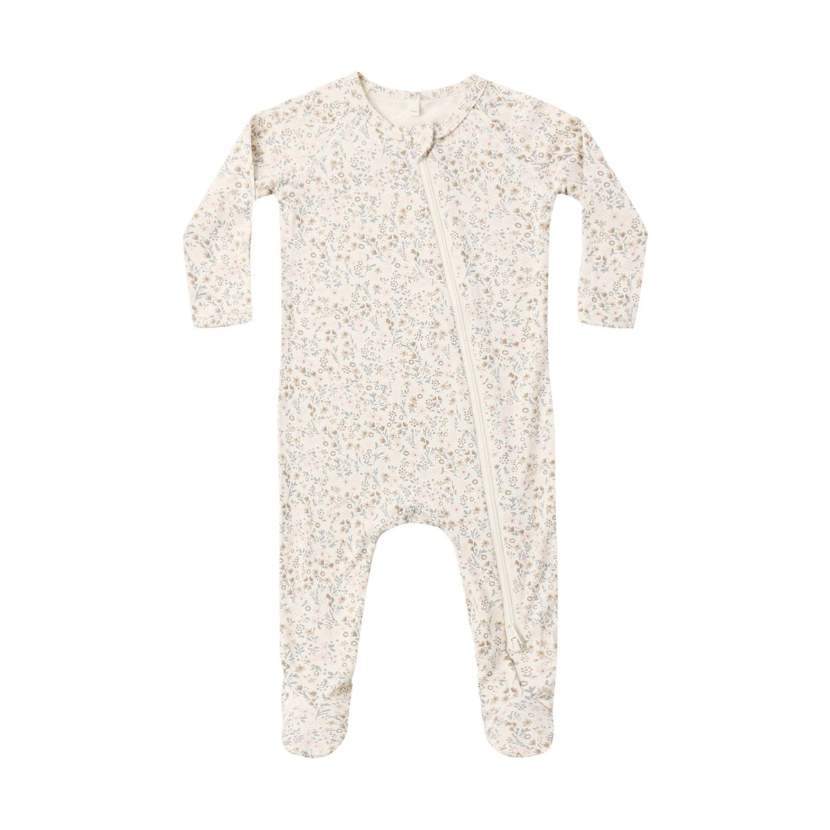 A long-sleeve baby footed sleeper in a cream-colored cotton fabric with a delicate, all-over small floral print in muted shades of green, blue, and pink. It features a front zipper closure and is photographed flat against a solid white background.