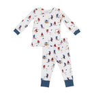 A two-piece children's pajama set featuring a white long-sleeve top and matching pants with a repeating hockey player print in red and blue, finished with solid navy blue cuffs.