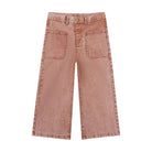 A pair of wide-leg pants in a pumpkin color, styled like denim jeans with a button closure and front pockets, shown flat on a white background.
