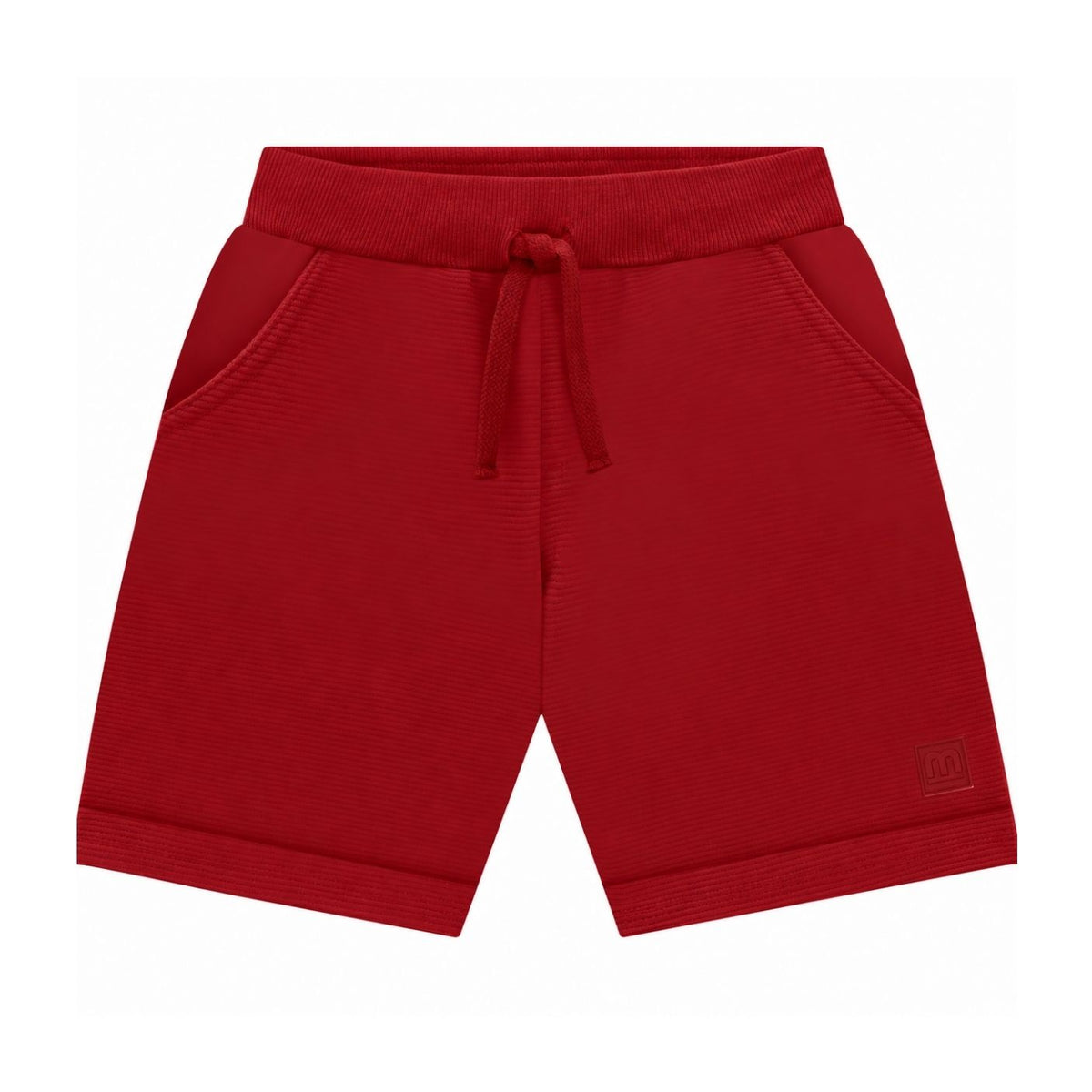 Red ribbed knit shorts with an elastic drawstring waistband, side pockets, and a small tonal logo patch on the lower left leg, shown against a plain white background.