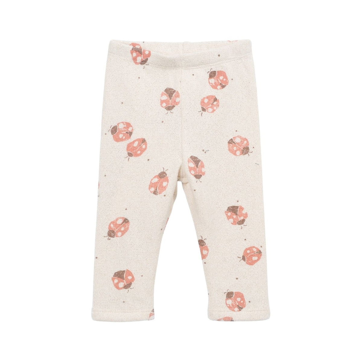A pair of baby leggings in a light cream color, featuring an all-over print of pink ladybugs with brown details.