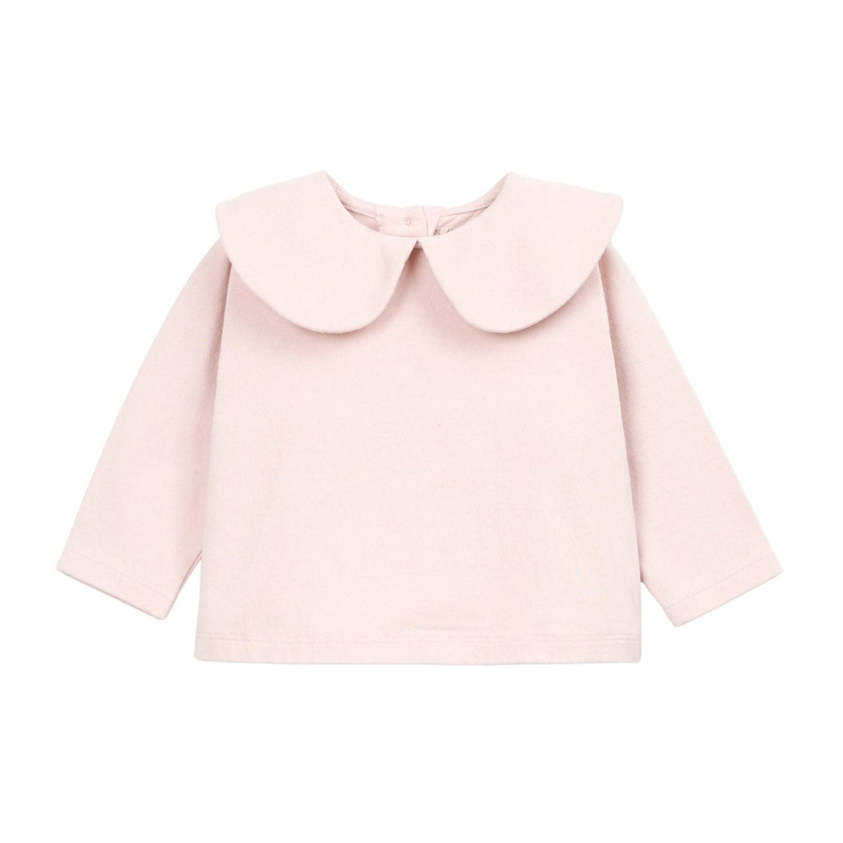A light pink long-sleeve baby top with a large Peter Pan collar, shown flat against a solid white background.