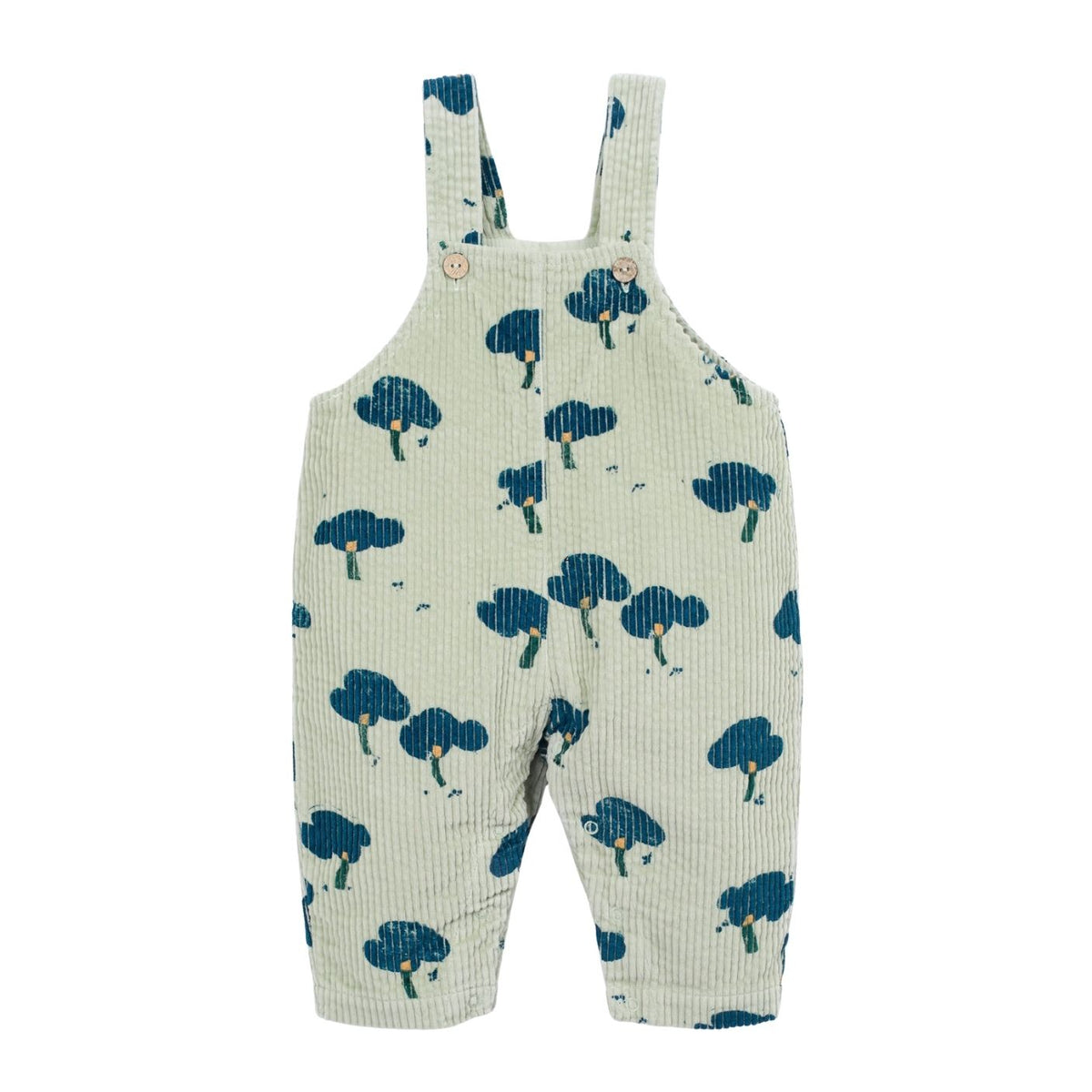 A baby's short-overall romper in a ribbed cream fabric with a dark blue tree print, shown flat against a white background.