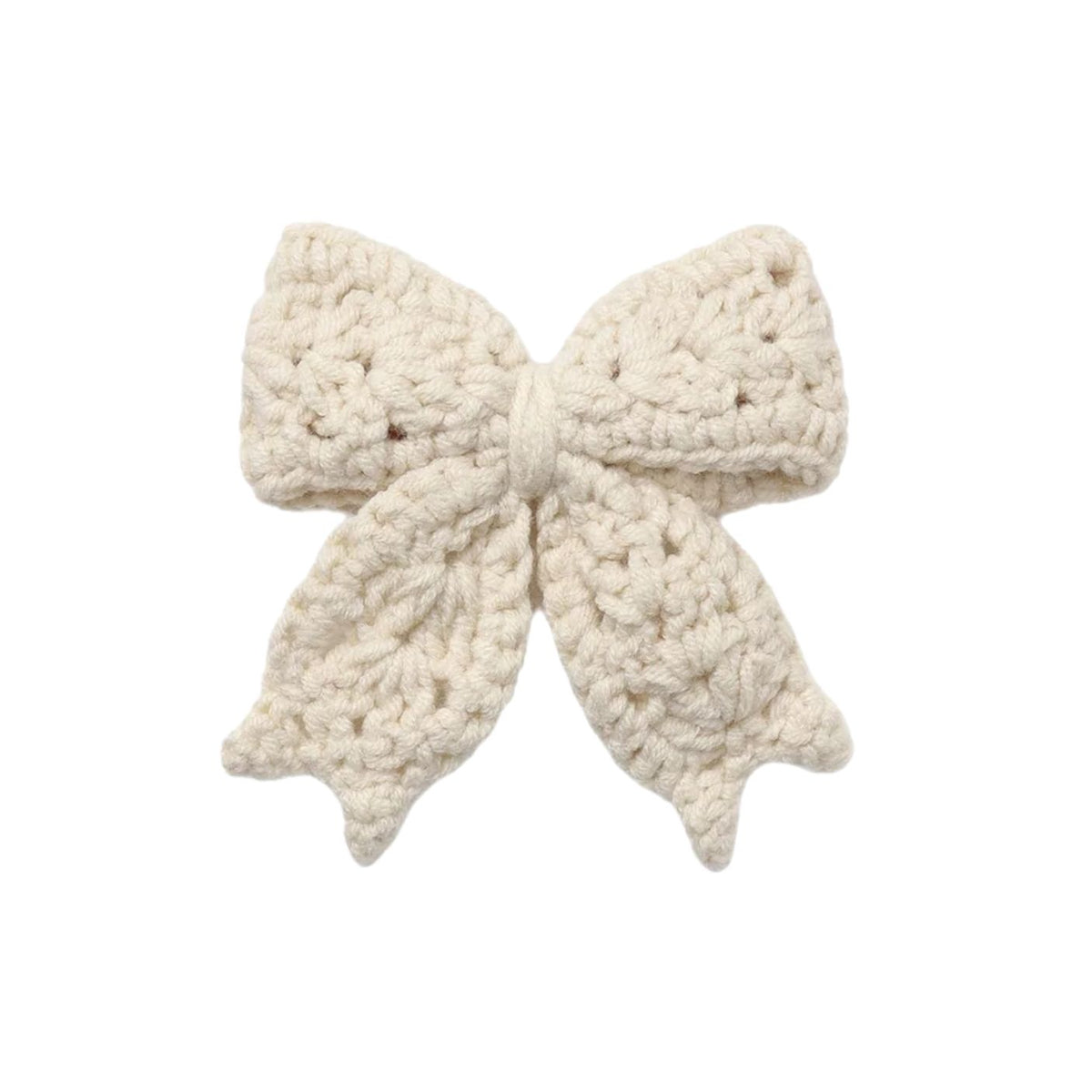 A natural-colored crochet hair bow made of 100% organic cotton, featuring a delicate textured design and attached to a gold alligator clip.