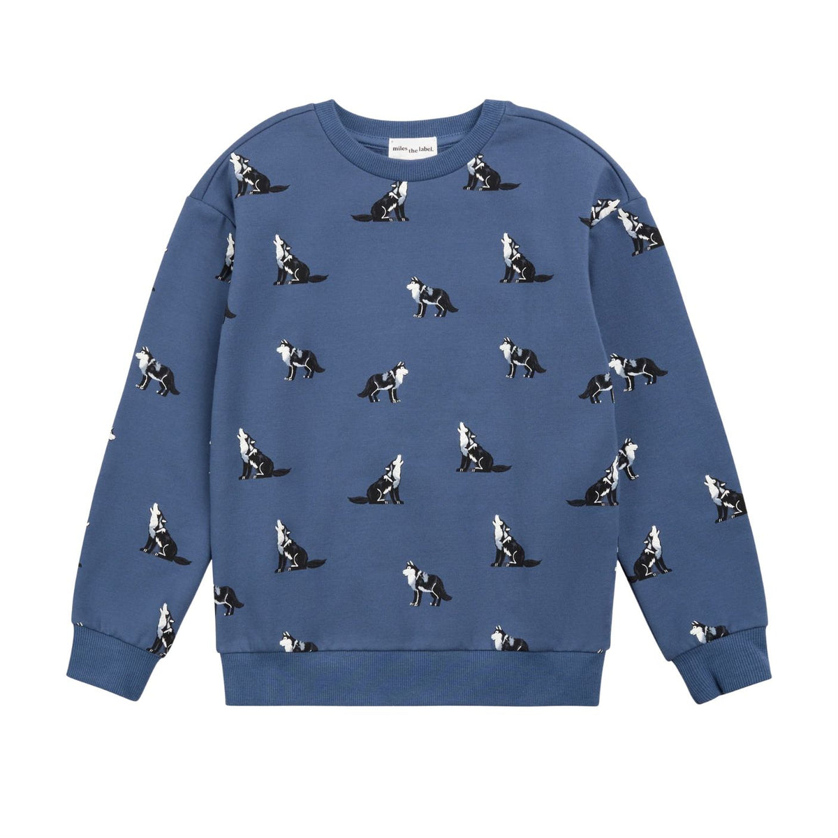 A blue crewneck sweatshirt featuring an all-over print of black and white dogs, shown flat against a plain white background.