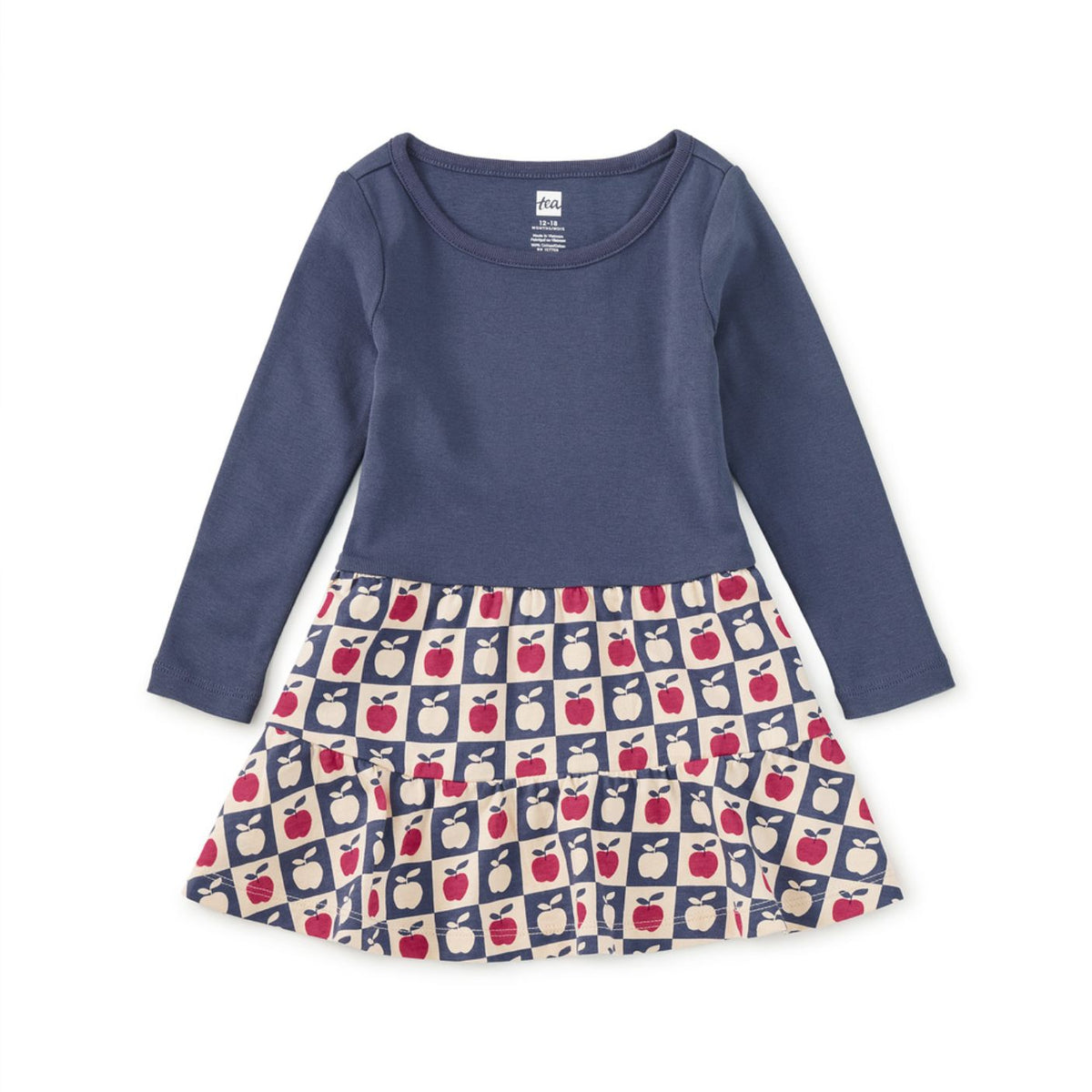 Navy blue long-sleeve dress with a patterned skirt on a white background