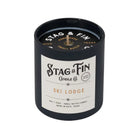 Stag & Fin candle with label on a white background