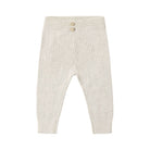 Off-white ribbed knit pants for toddlers, featuring a buttoned elastic waistband and elastic ankle cuffs, shown against a plain white background.