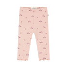Pink toddler leggings with a small repeating pattern of tiny red cars and bows, featuring a ruffled hem.