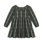 A long-sleeve toddler dress in a dark green and gray plaid pattern with white and red accent lines, featuring a ruffled collar and tiered skirt, shown on a plain white background.