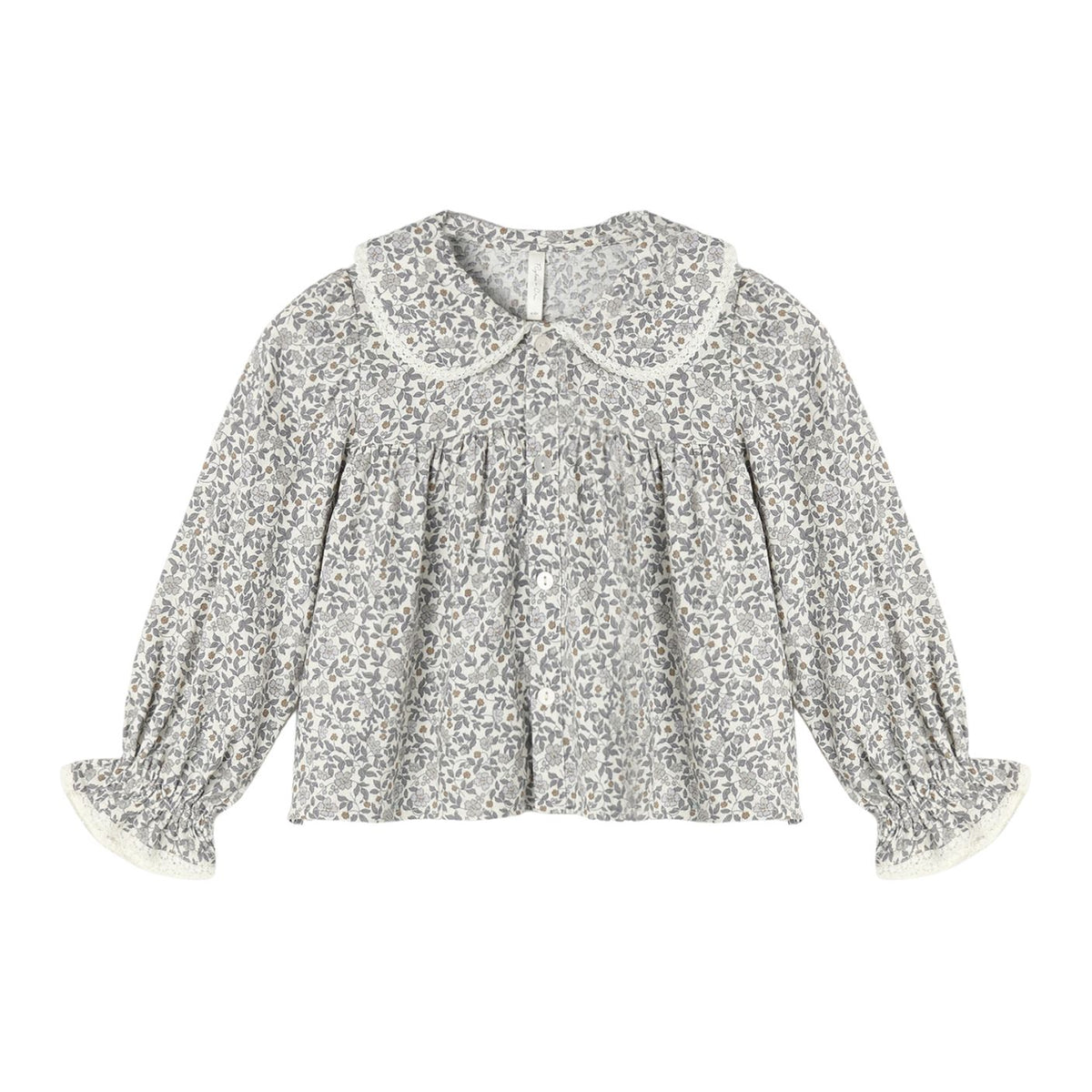 A long-sleeve blouse with a dense gray and white floral print, featuring a Peter Pan collar, gathered front, and ruffled cuffs, shown flat on a white background.