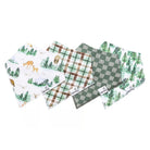 Set of four baby bibs with nature-themed prints on a white background